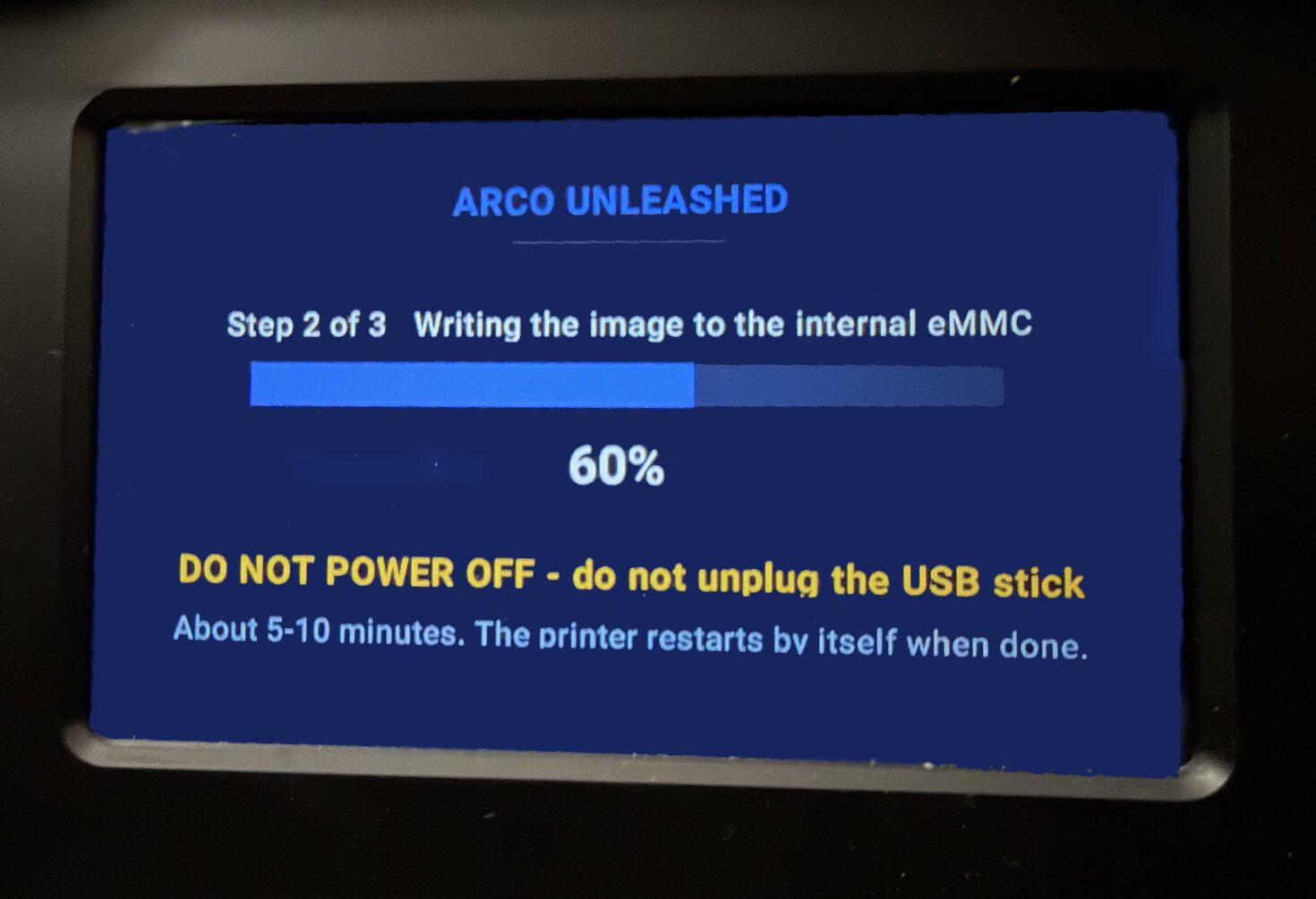 Display: step 2 of 3, writing the image to the internal eMMC, 60%, DO NOT POWER OFF